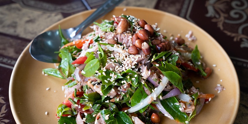 An image of Tea Leaf Salad (Laphet Thoke), a tourist favourite and the best food in Myanmar.