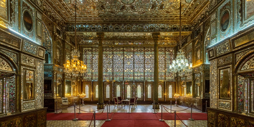 Golestan Palace interior showcases intricate tilework and Persian architectural elements.
