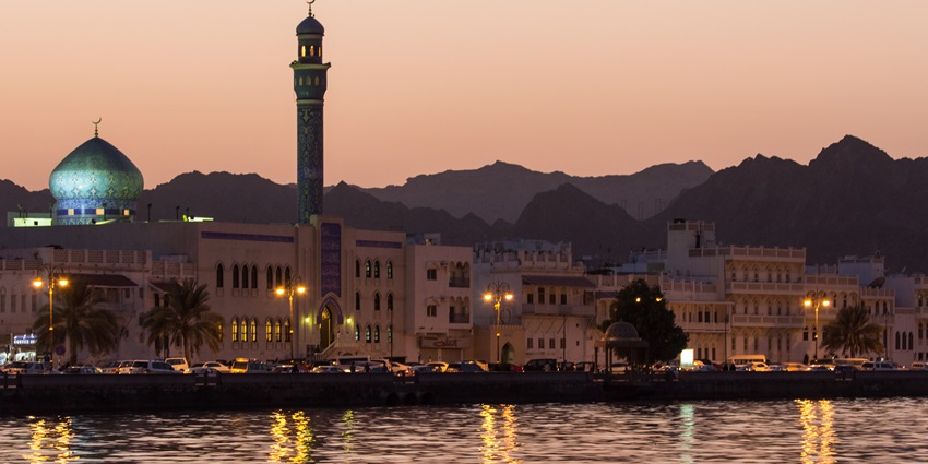 Picture of blue dom mosque across the waterbody near Muttrah Corniche–Things to do in Muscat in Summer