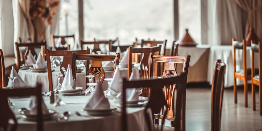 Snapshot of the empty Restaurants with brown wooden chairs and table