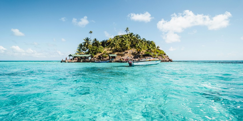 Image of Green and Brown Island on Blue Sea Under Blue Sky - things to do in isla de Providencia