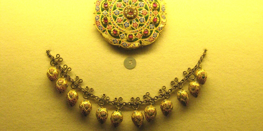 Display of Iran's National Jewels, featuring pure gold beautiful ornamental pieces.
