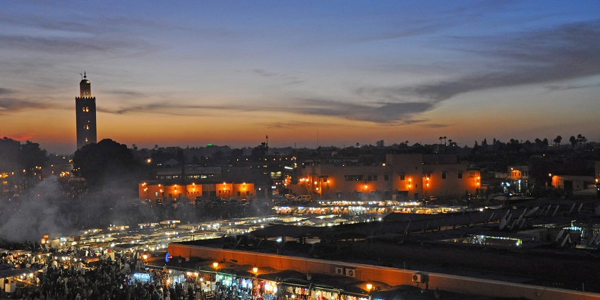 Bustling open-air market alive with colour, culture, and a sea of energetic crowds