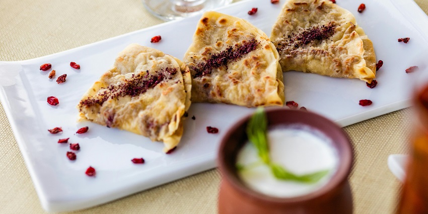 Enjoy diverse cuisine in the Baku Old City, Azerbaijan, with scenic views and cultural experiences.