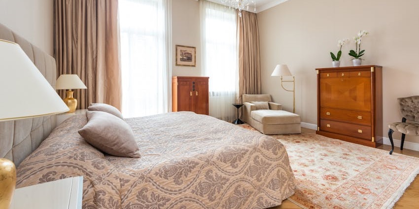 The hotel room provides a cosy stay with charming decor and warm ambiance.