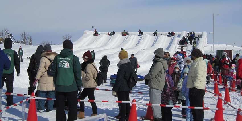 Locals enjoying the Sapporo Snow Festival at Odori, an adventurous thing to do in Hokkaido