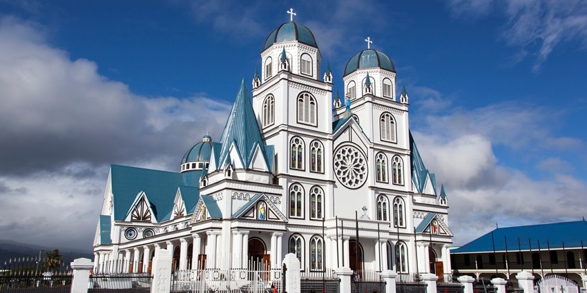 Worshipping the Immaculate Conception Cathedral, one of things to do on Samoa Islands
