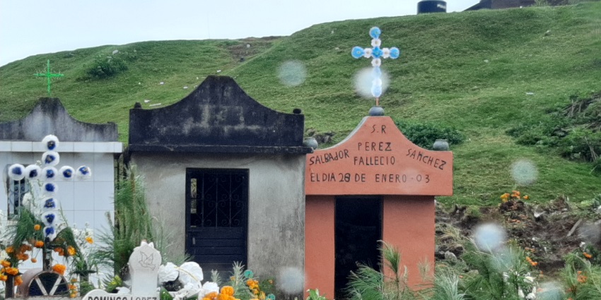Flowers and offerings placed in a cemetery during the Day of the Dead festival in November