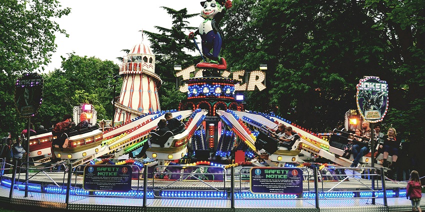 Families enjoying rollercoaster at Plopsaland, part of the top things to do in Belgium with family.