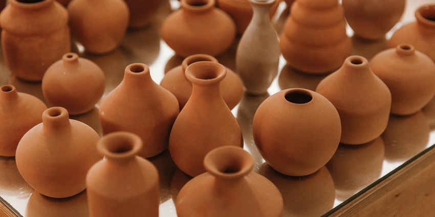 Image of finished clay pots, in a pottery shop, one of the things to buy in South Africa