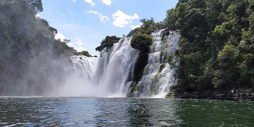 Ahuashiyacu Waterfall, flowing on the rocky surface, is one of the waterfalls in Peru