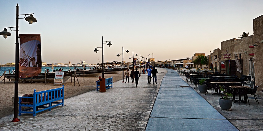 An image showing Al Wakrah Souq and a nearby beach, among the famous places to visit in Wakra.