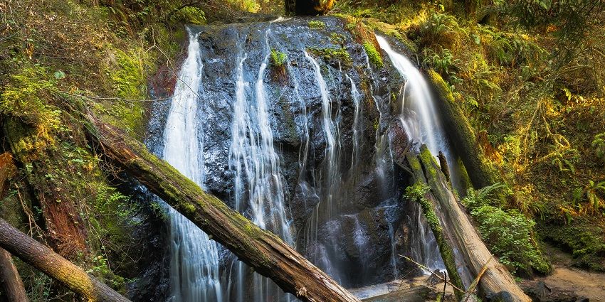 Antelope Falls with lush trails and mountain views one of the scenic waterfalls in Belize