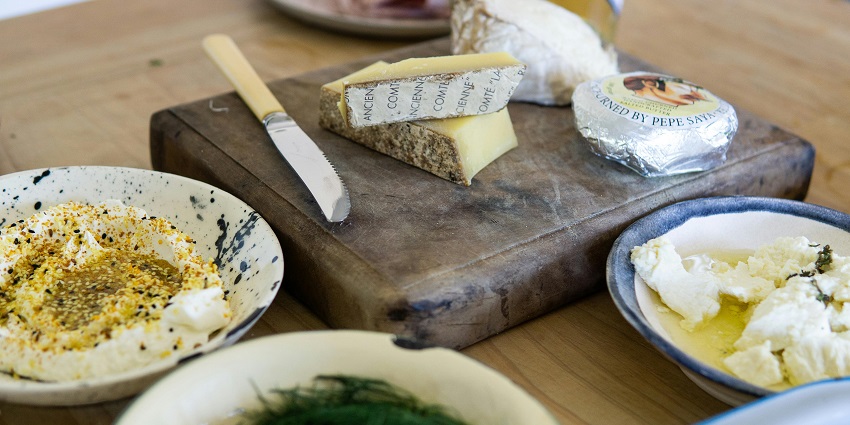 Selection of French artisan cheeses, safely vacuum-packed for travel, offering gourmet flavours.