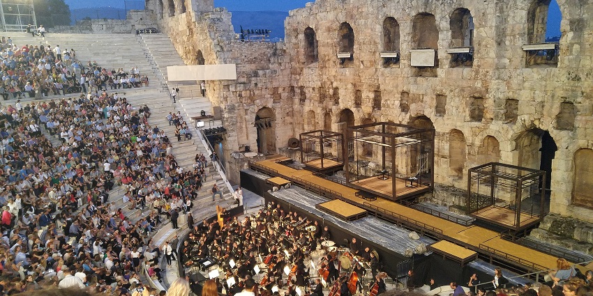 The crowded Odeon of Herodes Atticus amphitheatre in Athens is hosting an opera show, celebrating festivals in Greece