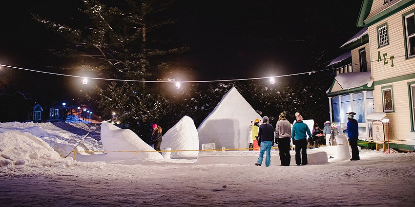 An image of a winter carnival with snow and lighting all around similar to in Saskatoon