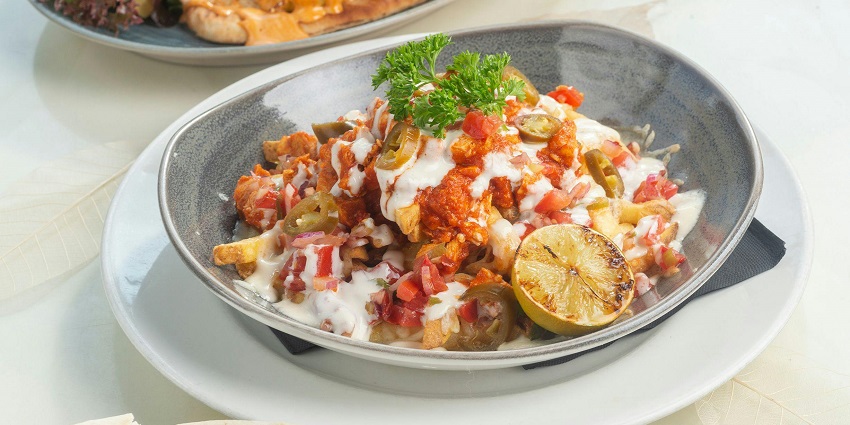 an image of a sophisticated dish at Au Jardin, demonstrating the intermingling of French cooking techniques with Malaysian cuisine.