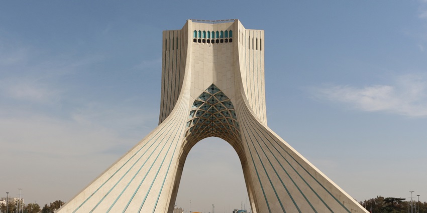 A low-angle view of the majestic Azadi Tower, an architectural marvel of the region.
