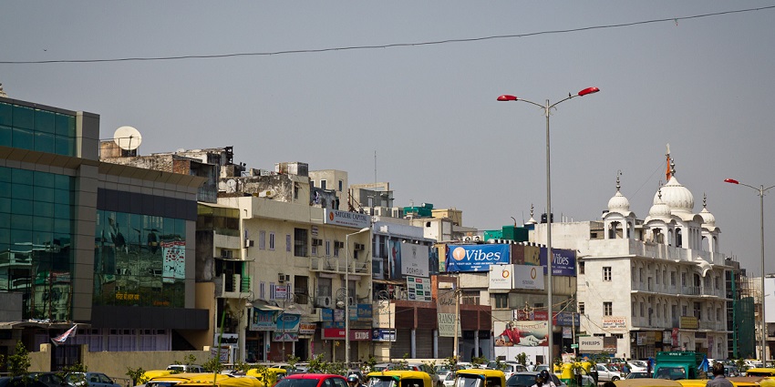 Image of the street going directly through the Hauz khas and nearby Lotus Temple