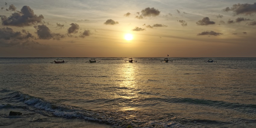 Bali’s temples, rice terraces, and beaches are perfect places to visit near Malaysia.