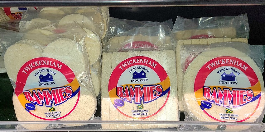 Image of packaged slices of golden-fried Bammy served with fried fish in Jamaica.