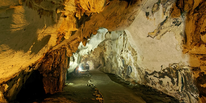Inside Trung Trang Cave, Cát Bà Island, visitors marvel at the natural limestone formations