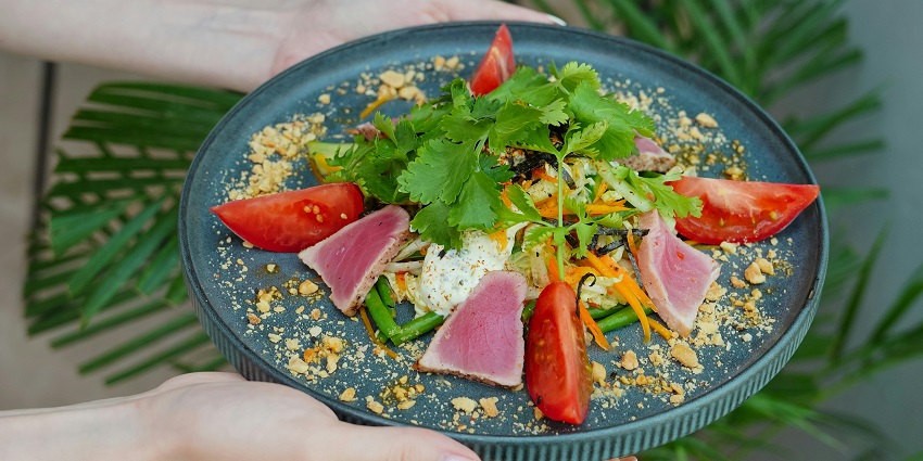 an image of a Creative plating at Beta KL showcasing innovative Malaysian cuisine.