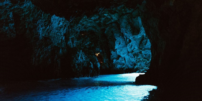 Glowing blue waters of the Blue Cave in Croatia, the most beautiful cave to explore