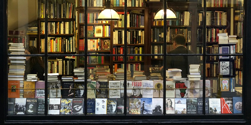 An image of books in a bookshop, which are some of the popular things to buy in London.
