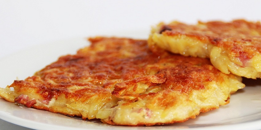 An image showing Bramboráky, one of the best foods to eat in the Czech Republic.
