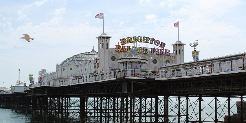 Walk along the Palace Pier, packed with arcade games, among the things to do in Brighton.