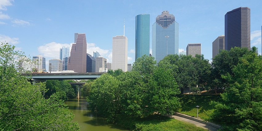Houston skyline is seen from Buffalo Bayou Park, among the places to visit near Houston.