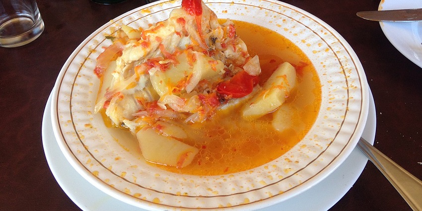 An image showing a view of Caldillo de Congrio, one of the best foods in Chile.