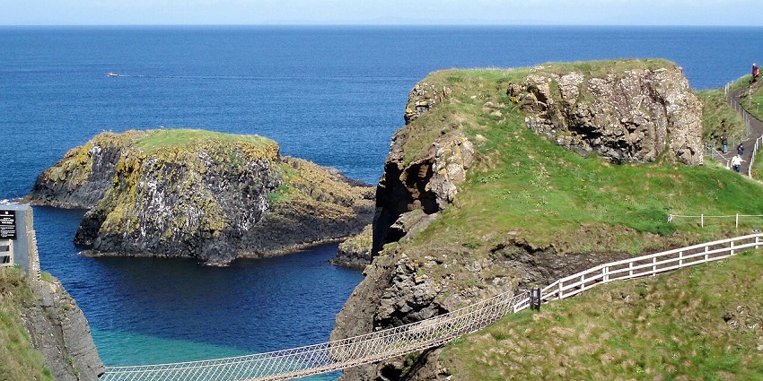 A view of the Carrick-a-Rede Rope Bridge - one of the top places to visit near Belfast.