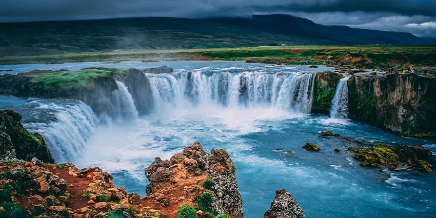 Water splashing near Villa La Angostura, surrounded by greenery and serene natural beauty.