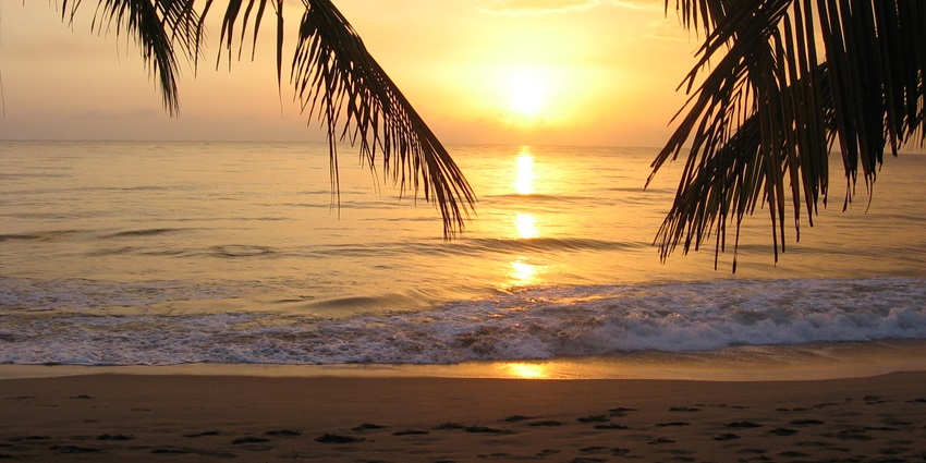 Witness a breathtaking sunset at the shores of Rincon, the surf capital of the territory.