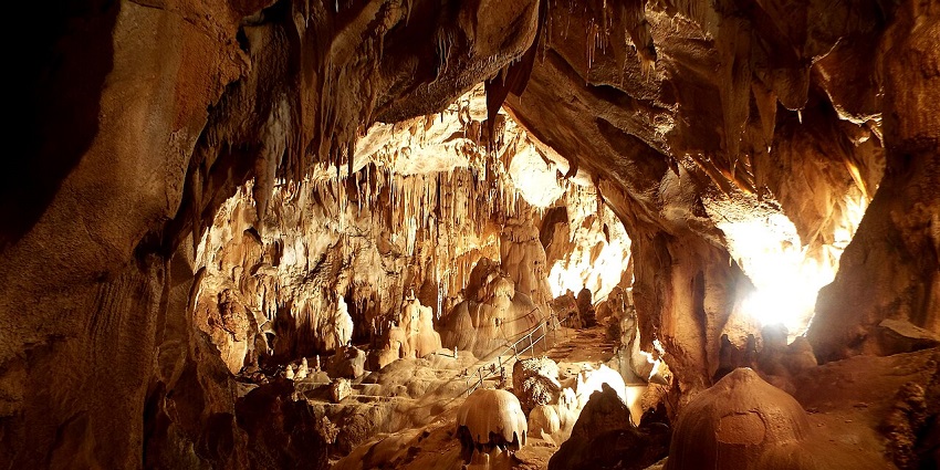 The entrance to the glowing insides of the Cerovac Caves, among 10 caves in Croatia.