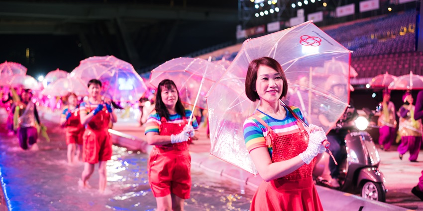 Image of Chingay performers walk past at the annual parade - one of the festivals in Singapore