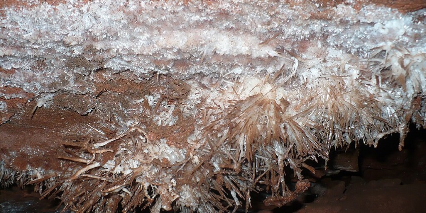an image of a boat floating on the underground lake inside the Lost Sea in Tennessee