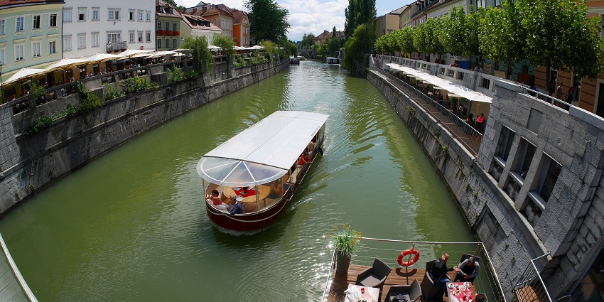 Take a relaxing riverboat ride to admire the charming cityscape from the peaceful Ljubljanica waters.