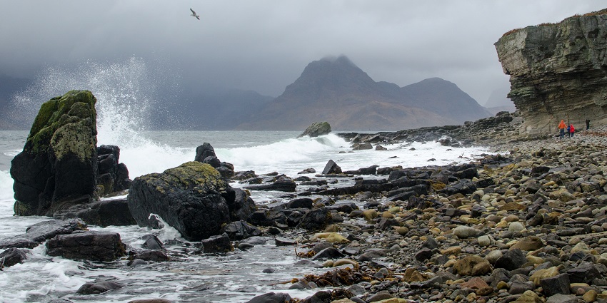 Remote freshwater loch surrounded by the Cuillin mountains, reached via scenic boat ride.