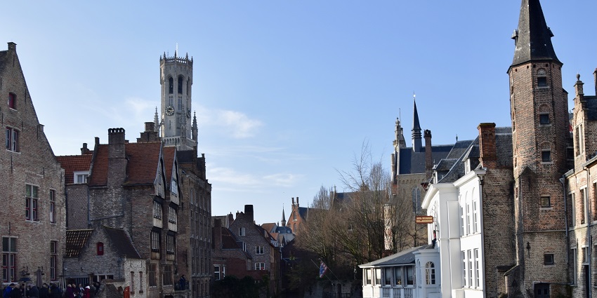 Image of the canals in Bruges; cruising here is one of the top things to do in Belgium with family.