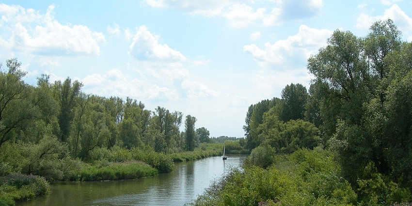 View of peaceful waterways and lush greenery- top things to do in Southern Netherlands
