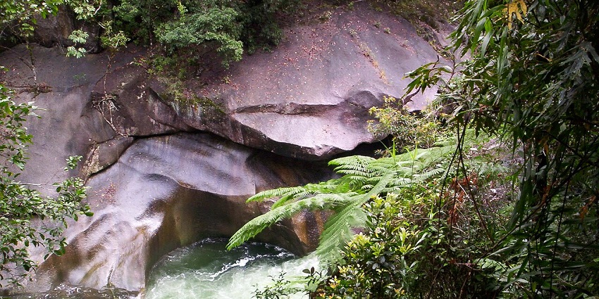 A natural rock pool shrouded in Aboriginal legend and mysterious drownings, set in lush rainforest, among the most haunted places in Australia.