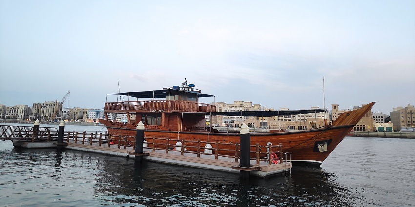 Admire miniature dhow boat models as symbolic souvenirs, one of the things to buy in Kuwait