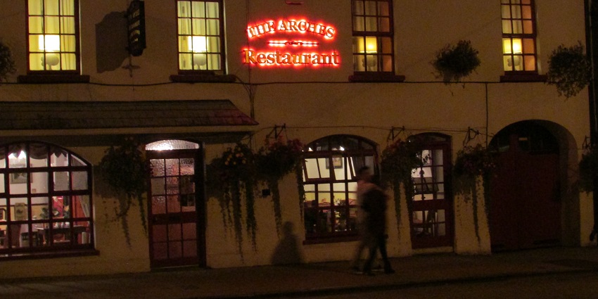 Night view of the Arches Restaurant, a five-star family restaurant in Adare, Ireland.