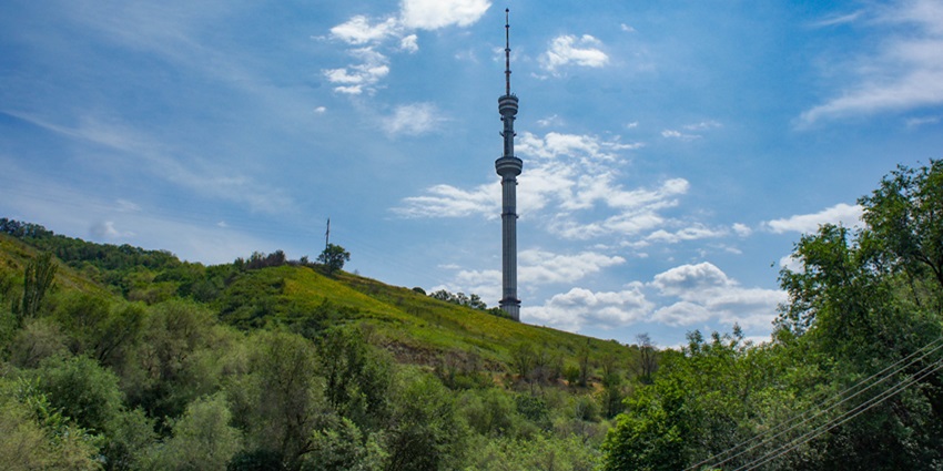 An image showing a view of Almaty from the top of Kok-Tobe Hill, a popular spot in Kazakhstan.