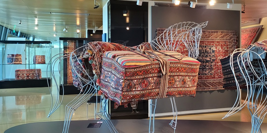 Patterned displays of carpets inside the Baku Carpet Museum, a must-visit winter activity in Baku.