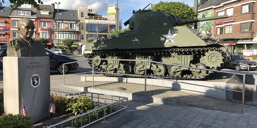 An image showing the Sherman Tank at Place McAuliffe in Bastogne.