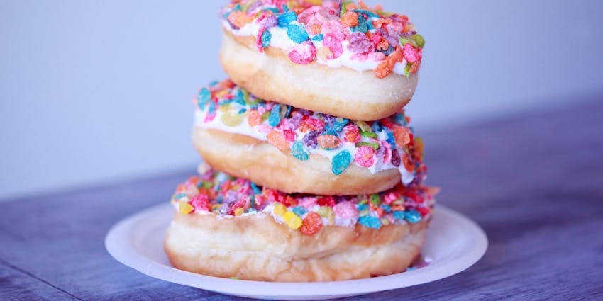 An image showing a doughnut, one of the best street foods in London, England.